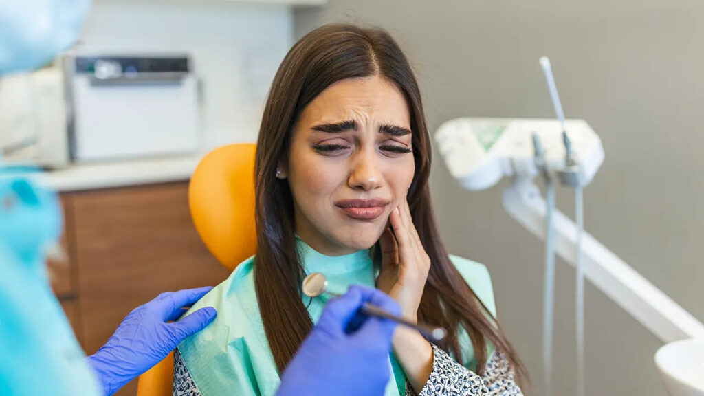 How does tooth enamel protect the nerves?