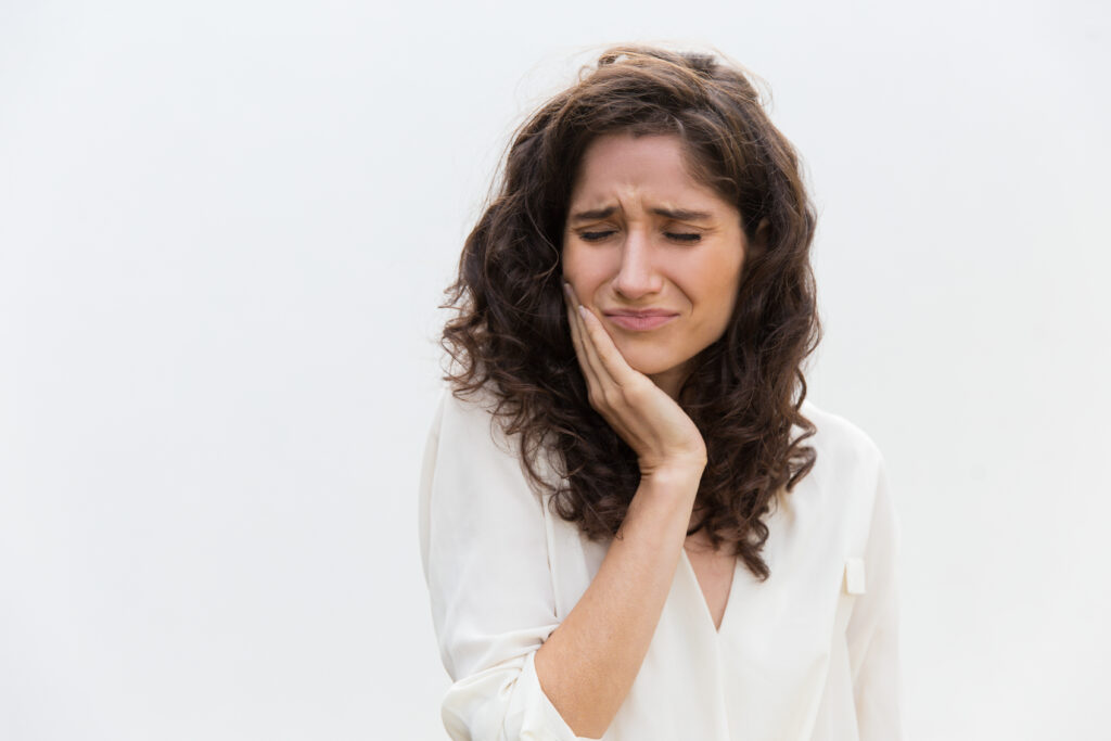 frustrated unhappy woman suffering from toothache